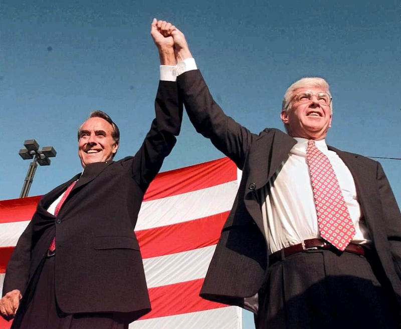 US Republican presidential candidate Bob Dole (L) and vice presidential candidate Jack Kemp (R) arrive for a welcoming rally in San Diego, California, 14 October. Dole is in San Diego, to prepare for the last of the presidential debates to be held in San Diego 16 October.  (ELECTRONIC IMAGE) 
    AFP PHOTO J. David AKE / AFP PHOTO / J. DAVID AKE