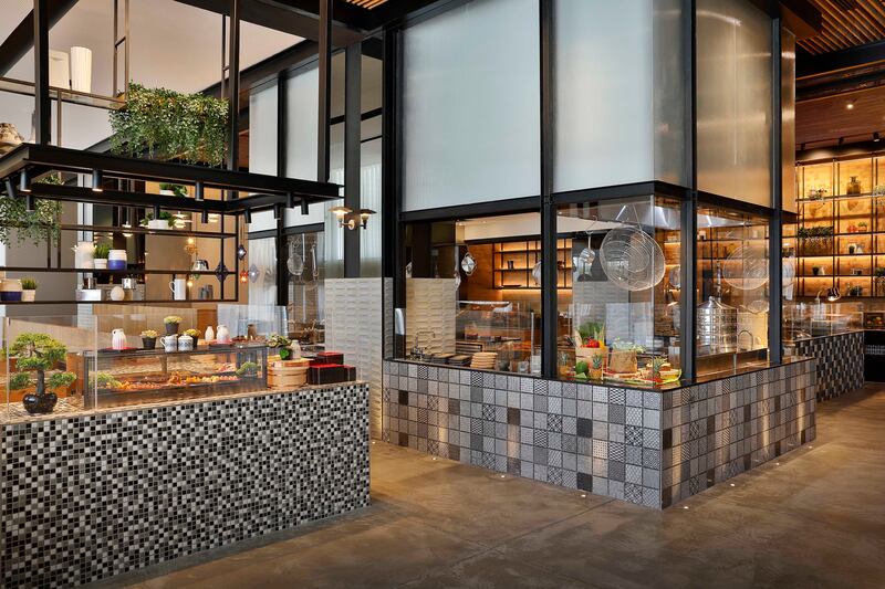Cooking stations at Graphos Social Kitchen at Hilton Abu Dhabi Yas Island. Photo: Graphos Social Kitchen