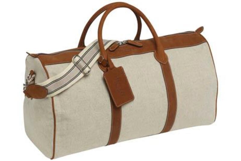 A handout photo of Canvas/leather Herringbone holdall in brown (Courtesy: Hackett London)