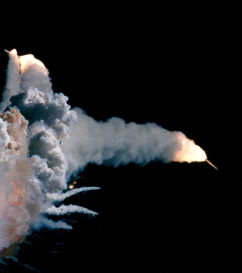 Solid rocket boosters fly in opposite directions after the fatal explosion of Space Shuttle Challenger during NASA shuttle orbiter mission STS-51-L over Cape Canaveral, Florida on January 28, 1986. All seven crew members, consisting of five NASA astronauts and two payload specialists, died in the disaster. (Photo by Ralph Morse/The LIFE Images Collection via Getty Images via Getty Images)
