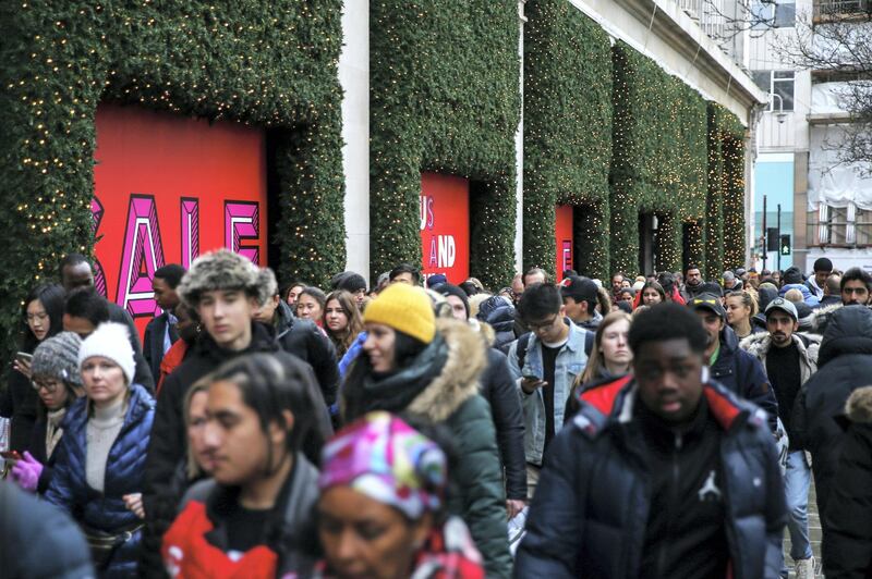 LONDON, ENGLAND - DECEMBER 26: Crowds of shoppers pass Selfridges during the Oxford Street Boxing Day Sales on December 26, 2019 in London, England. (Photo by Hollie Adams/Getty Images)