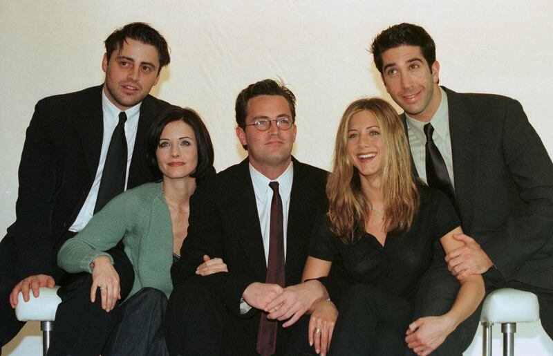 FILE PHOTO: The cast of the American TV sitcom "Friends" (L to R) Matt Le Blanc, Courteney Cox, Matthew Perry,  Jennifer Aniston and David Schwimmer pose for pictures at Channel 4 Television centre March 25, 1998./File Photo