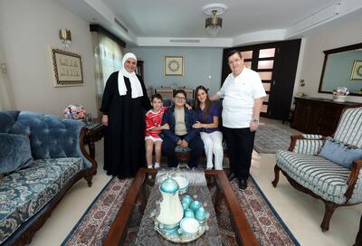 Omar Kilani with his parents, Rula Atallah and Mahdi Kilani, and siblings, Noor and Mohammad. Chris Whiteoak / The National
