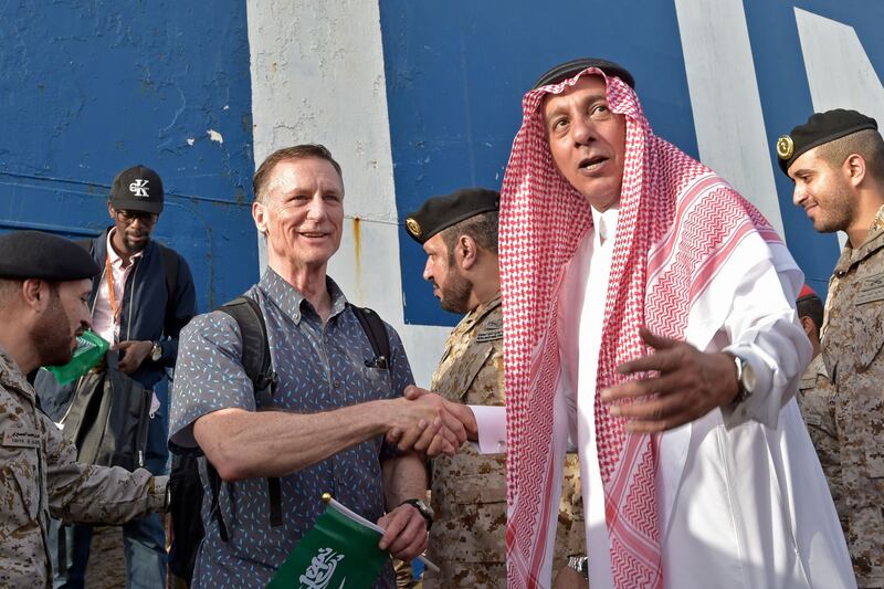 Foreign Ministry director general Mazen Al Hamli welcomes evacuees. AFP