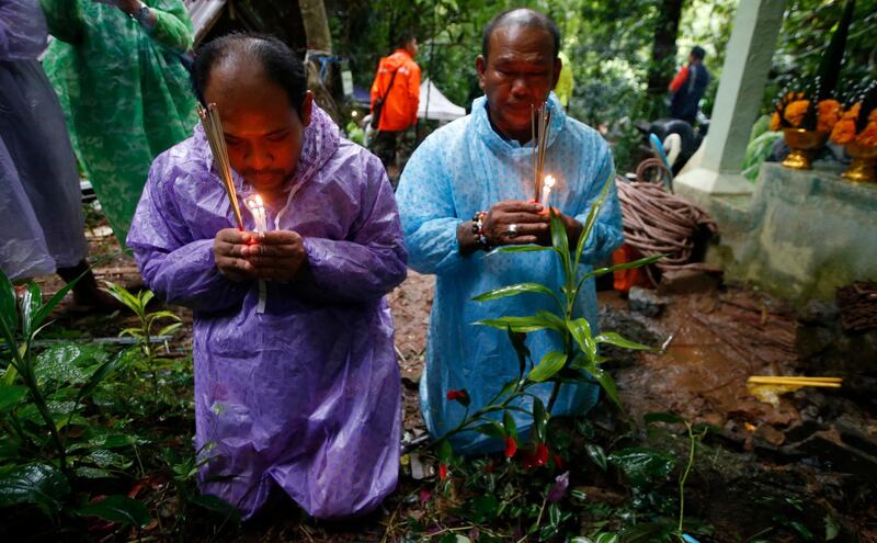 Forecasters said light rain would continue to fall on Wednesday. Sakchai Lalit / AP Photo