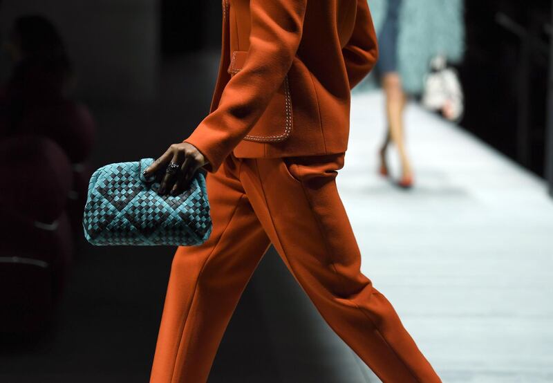 A model walks the runway during the Bottega Veneta Fall/Winter 2018 fashion show at the American Stock Exchange on February 9, 2018 in New York City. / AFP PHOTO / ANGELA WEISS