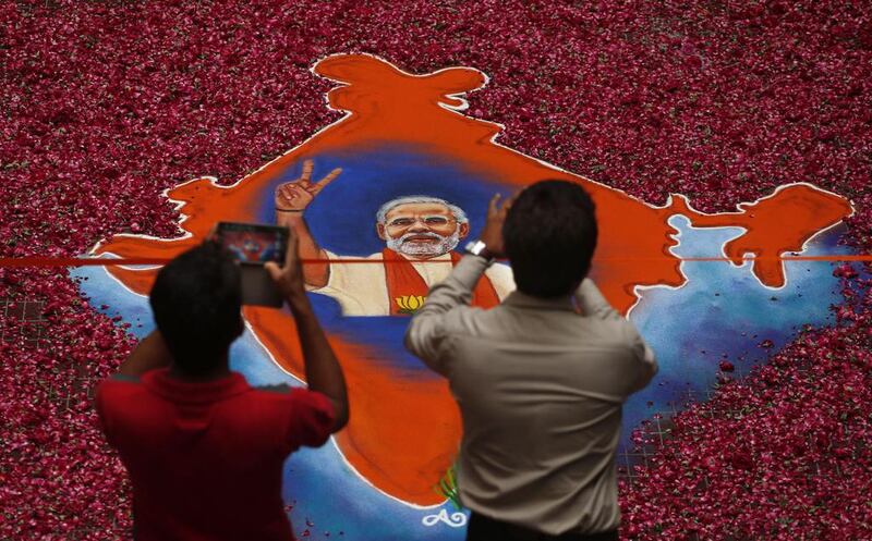 The overwhelming victory gives Mr Modi, a 63-year-old career politician, a strong mandate to govern India at a time of deep social and economic change. AP Photo / May 16, 2014