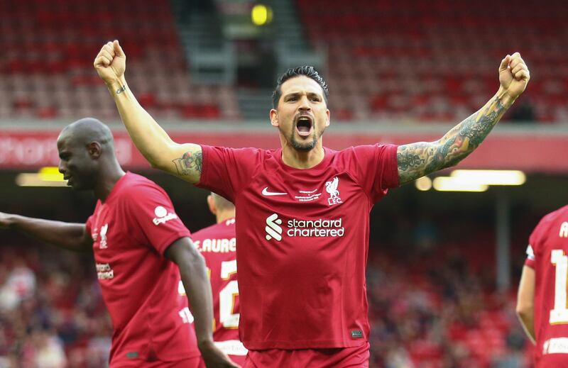 Liverpool's Mark Gonzalez celebrates levelling the scores at 1-1 with Manchester United during the Legends match at Anfield. Liverpool won the match 2-1. PA