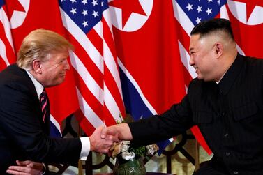 US President Donald Trump shakes hands with North Korean leader Kim Jong Un in Hanoi. AP/ Evan Vucci