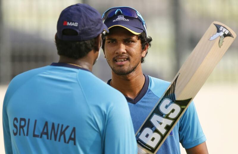 Sri Lanka's captain Dinesh Chandimal, right, is not sure if he will opt out of playing against India in the World Twenty20 final to stay with pace bowler Lasith Malinga at the helm. Aijaz Rahi / AP Photo

