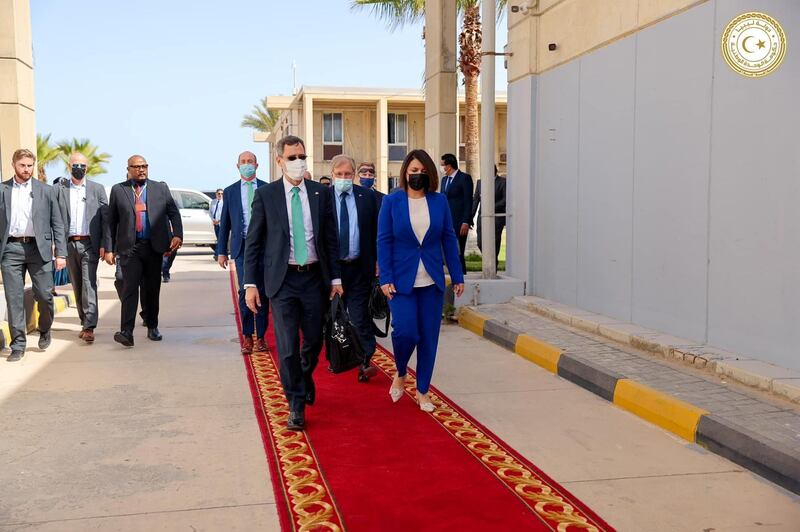 US Acting Assistant Secretary of State for Near Eastern Affairs Joey Hood walks with Libyan Foreign Minister Najla el-Mangoush upon his arrival, in Tripoli, Libya May 18, 2021. Media Office of the Prime Minister/Handout via REUTERS ATTENTION EDITORS - THIS IMAGE HAS BEEN SUPPLIED BY A THIRD PARTY.