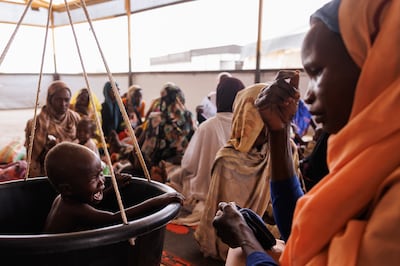 Sudanese children and their mothers undergoing checks for malnutrition at a Doctors Without Borders clinic at a refugee transit camp in Adre, Chad. Getty Images