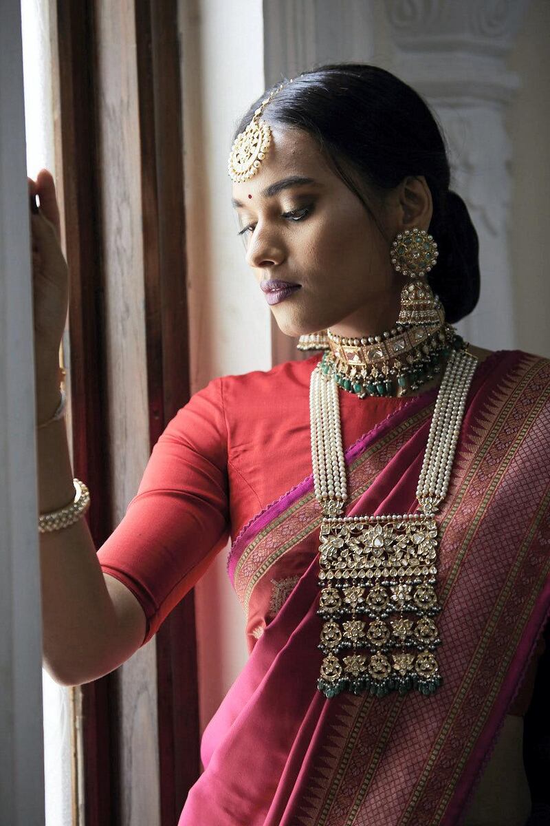 The latest trend in Indian jewellery is combing a choker with a longer necklace, as seen in this look; jewels by Kishandas & Co; outfit by Gaurang Shah. Courtesy Numaish