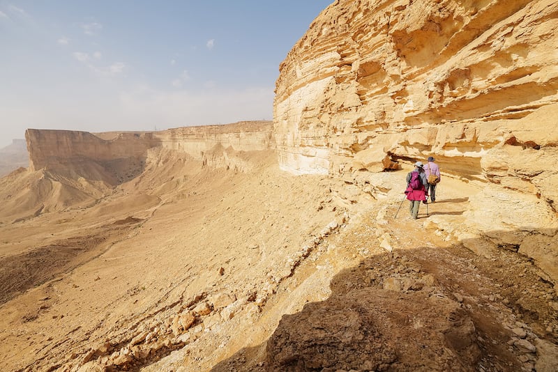 The limestone ridge of Jabal Tuwaiq can be ascended by a series of winding paths
