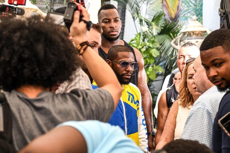 Floyd Mayweather arrives for the media availability ahead of his exhibition boxing fight against Logan Paul. AFP