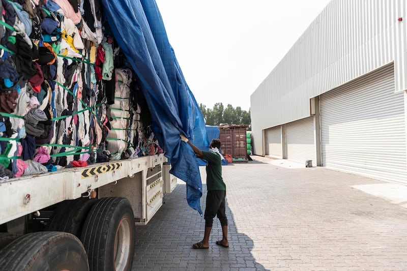 DUBAI, UNITED ARAB EMIRATES. 24 OCTOBER 2019. Second hand clothing from the UK, Australia and Europe is sported by type and quality at Hands Industries in Sharjah. Some clothes are destined to be re sold in third world markets in Africa while other damaged items are cut for use as rags in Industrial or commercial applications. (Photo: Antonie Robertson/The National) Journalist: Kelly Clarke. Section: National.
