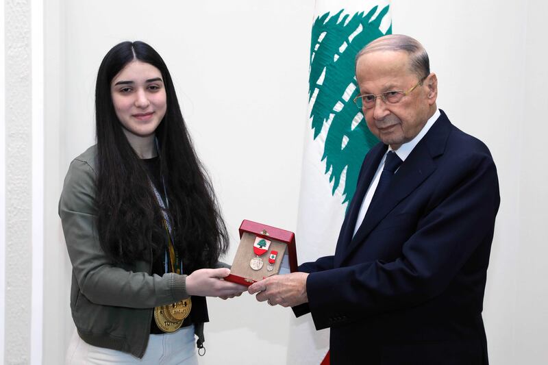Michel Aoun, who was president of Lebanon at the time, awards Khairallah with the Medal of Merit in 2022. Photo: Presidency of the Republic of Lebanon