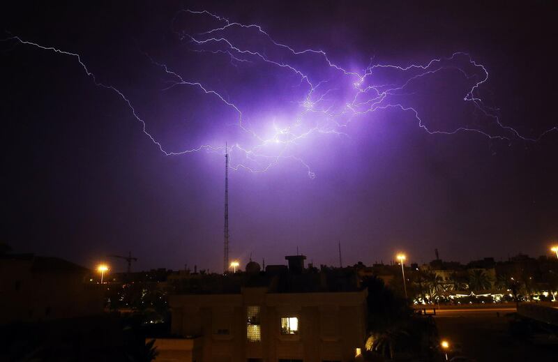 Lightning flashes in the sky over Rumaithiya district in Kuwait City during a storm.  AFP