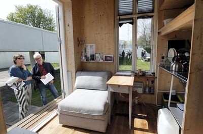 Mandatory Credit: Photo by Felipe Trueba/EPA/Shutterstock (8594904a)
People look at the interior of a home unit, a small mobile living space, part of a project of the Tiny House University at the Bauhaus Archive Museum of Design in Berlin, Germany, 10 April 2017. The Bauhaus Campus is an artistic experiment composed of 'Tiny Houses', mobile architectural structures no larger than a parking space, approaching topics such as minimal living space, co-working or study programs for refugees.
Tiny House project in Berlin, Germany - 10 Apr 2017