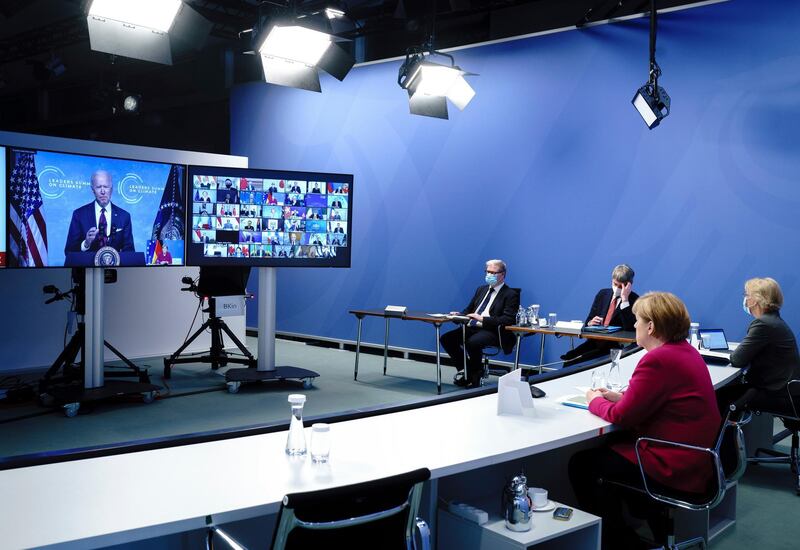 German Chancellor Angela Merkel attends a virtual international climate summit with US President Joe Biden in Berlin, Germany. AP