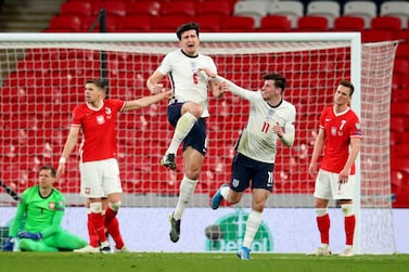 England's Harry Maguire celebrates scoring their second goal with Mason Mount Pool. Reuters