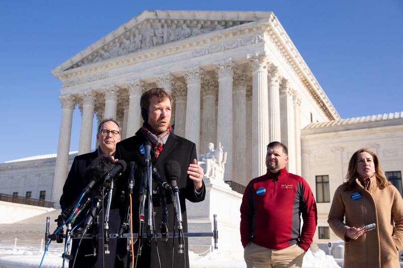 Brandon Trosclair, owner of a chain of grocery stores and plaintiff in a case before the Supreme Court challenging the US Department of Labour's Occupational Safety and Health Administration (OSHA) vaccine mandate, speaks outside the Supreme Court in Washington. EPA