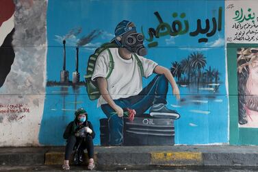 A mural that reads, 'I want my oil', in Baghdad, on December 8 2019. AP