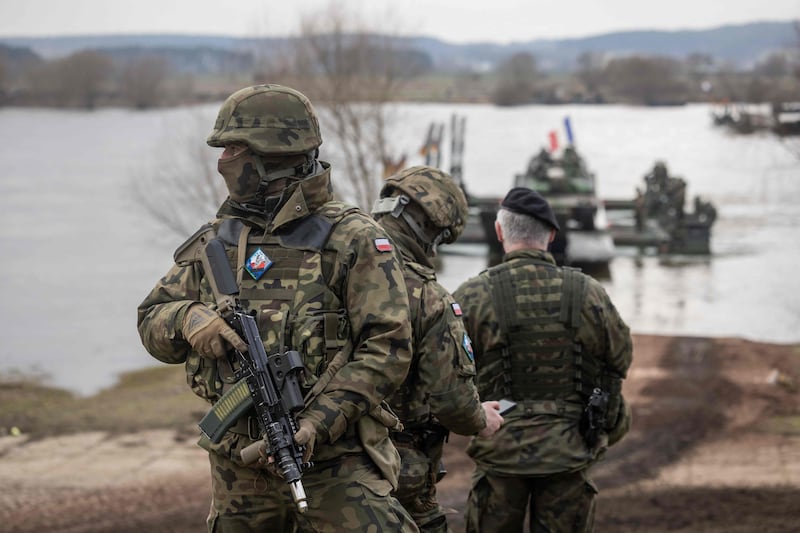 Polish soldiers take part in the Nato Dragon exercise in Korzeniewo. AFP