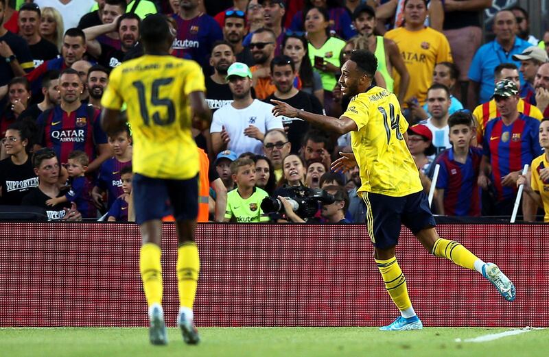 Aubameyang celebrates scoring Arsenal's opener. EPA