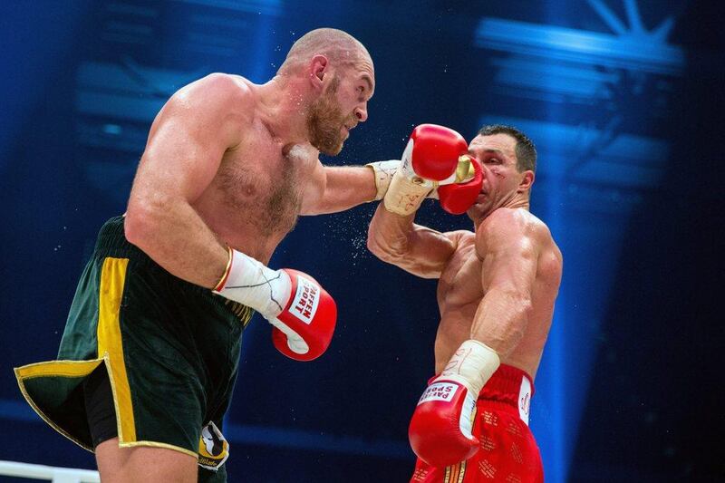 Tyson Fury in action against Wladimir Klitschko during their heavyweight title fight, won by Fury.   EPA/Rolf Vennenbernd