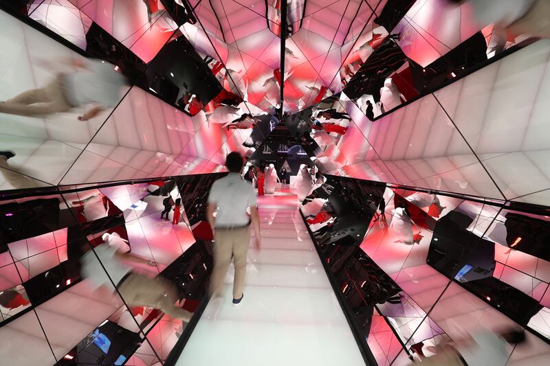 Visitors are treated to a visual kaleidoscopic experience as they walk through the hallway of the Monaco pavilion at Expo 2020 Dubai.