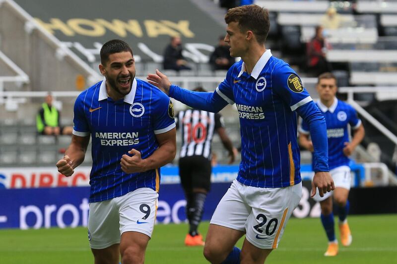 Brighton's French striker Neal Maupay (L) celebrates after scoring a penalty during the English Premier League football match between Newcastle United and Brighton and Hove Albion at St James' Park in Newcastle upon Tyne, north-east England on September 20, 2020. RESTRICTED TO EDITORIAL USE. No use with unauthorized audio, video, data, fixture lists, club/league logos or 'live' services. Online in-match use limited to 120 images. An additional 40 images may be used in extra time. No video emulation. Social media in-match use limited to 120 images. An additional 40 images may be used in extra time. No use in betting publications, games or single club/league/player publications.
 / AFP / POOL / Lindsey Parnaby / RESTRICTED TO EDITORIAL USE. No use with unauthorized audio, video, data, fixture lists, club/league logos or 'live' services. Online in-match use limited to 120 images. An additional 40 images may be used in extra time. No video emulation. Social media in-match use limited to 120 images. An additional 40 images may be used in extra time. No use in betting publications, games or single club/league/player publications.
