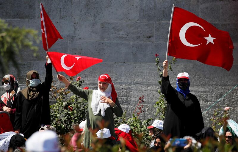 Dozens of worshippers broke through one police checkpoint to rush toward Hagia Sophia and social distancing practices, in place due to the coronavirus outbreak, were being ignored, Turkish media reported. Reuters