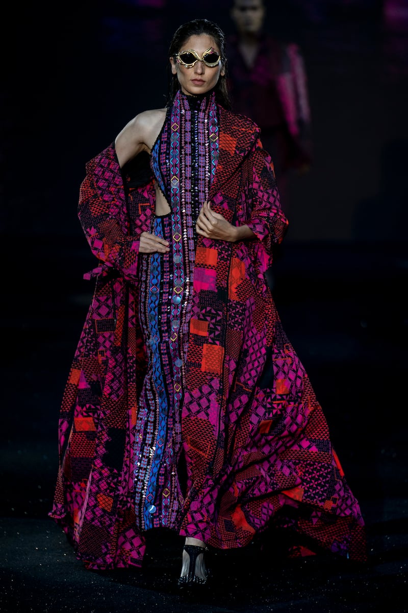 Rich patterns by Malhotra for the 2022 FDCI X Lakme Fashion Week. AP