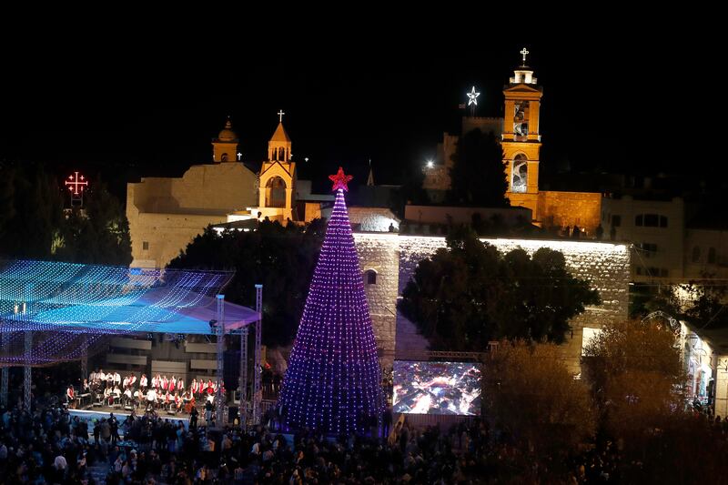 The large traditional Christmas tree in Manger Square. Bethlehem's Palestinians hope that tourist numbers will rise in the weeks before Christmas. EPA