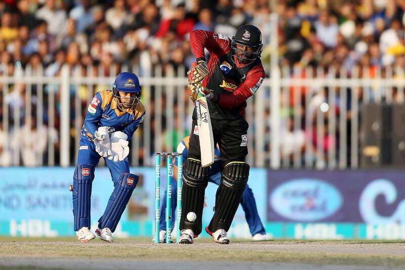 Chris Gayle of Lahore Qalandars playing a shot against Karachi Kings in the Pakistan Super League T20 match at Sharjah Cricket Stadium in Sharjah. ( Pawan Singh / The National )