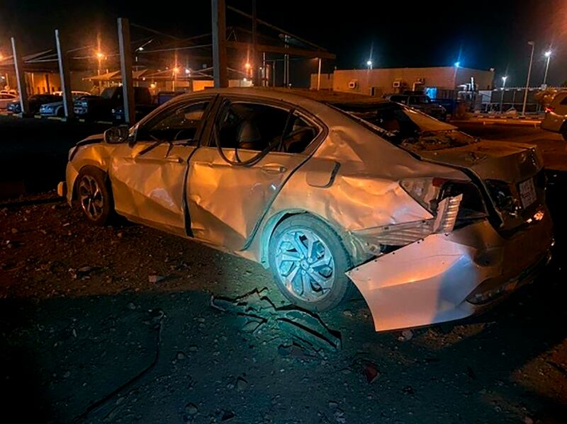 A damaged car at an Aramco terminal in the southern border town of Jizan, Saudi Arabia on Sunday. SPA