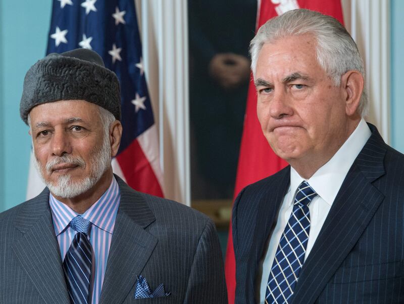 US Secretary of State Rex Tillerson(R) answers a question from the media standing with the Foreign Minister of Oman, Yusuf bin Alawi-bin Abdullah, inside the Treaty Room at US Department of State July 21, 2017, in Washington, DC. / AFP PHOTO / PAUL J. RICHARDS