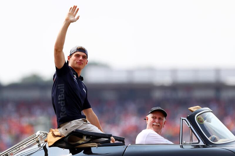 HOCKENHEIM, GERMANY - JULY 22:  Max Verstappen of Netherlands and Red Bull Racing waves to the crowd on the drivers parade before the Formula One Grand Prix of Germany at Hockenheimring on July 22, 2018 in Hockenheim, Germany.  (Photo by Dan Istitene/Getty Images)
