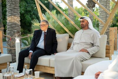 Sheikh Mohamed bin Zayed, Crown Prince of Abu Dhabi and Deputy Supreme Commander of the UAE Armed Forces (R) and Bill Gates (L), listen to a presentation about The Bill and Melinda Gates Foundation and the Reaching The Last Mile portfolio of global health programmes, in Abu Dhabi, on December 7. Ministry of Presidential Affairs 