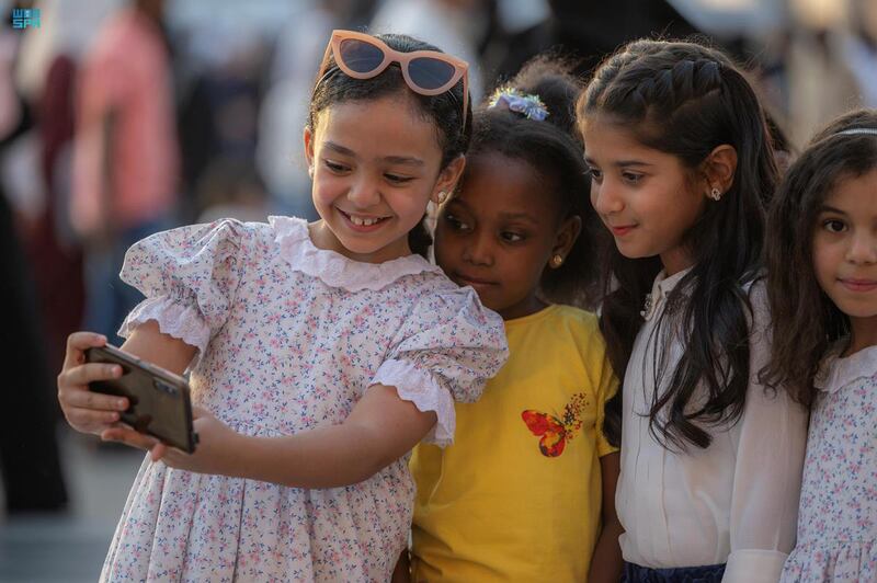 Children in Eid clothes in Madinah. All Photos: SPA