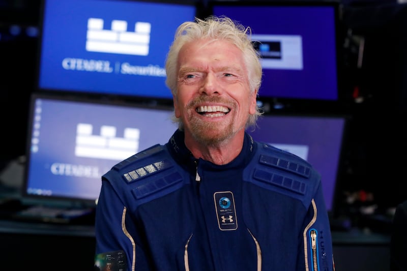 Richard Branson, founder of Virgin Galactic, is interviewed on the floor of the New York Stock Exchange. AP