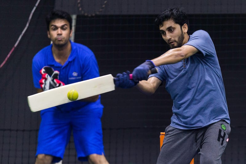 Dubai, United Arab Emirates, July 18, 2017:    A group of men play pick-up indoor cricket at the Insportz Club in the Al Quoz area of Dubai on July 18, 2017. Christopher Pike / The National

Reporter: Paul Radley
Section: Sport