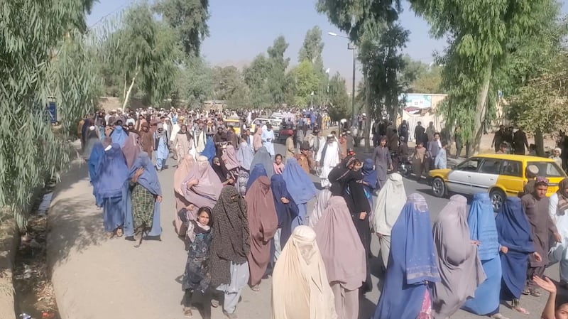 People hold a protest march against the Taliban's decision to force them to leave their homes in Kandahar, Afghanistan, in this still image taken from video.  REUTERS