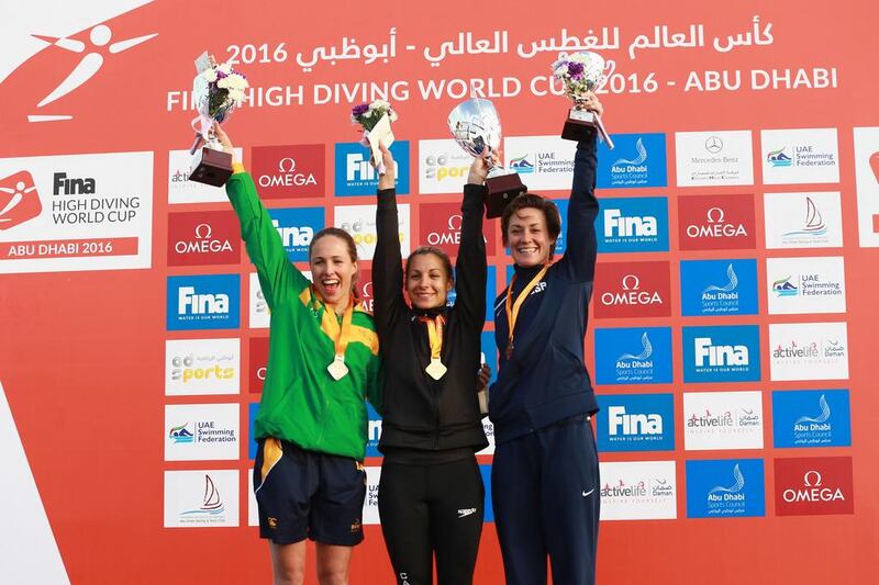 Lysanne Richard (Centre) after being crowned the Fina Women’s High Diving World Cup in Abu Dhabi. 28 February 2016. Photo Courtesy: Fina High Diving World Cup
