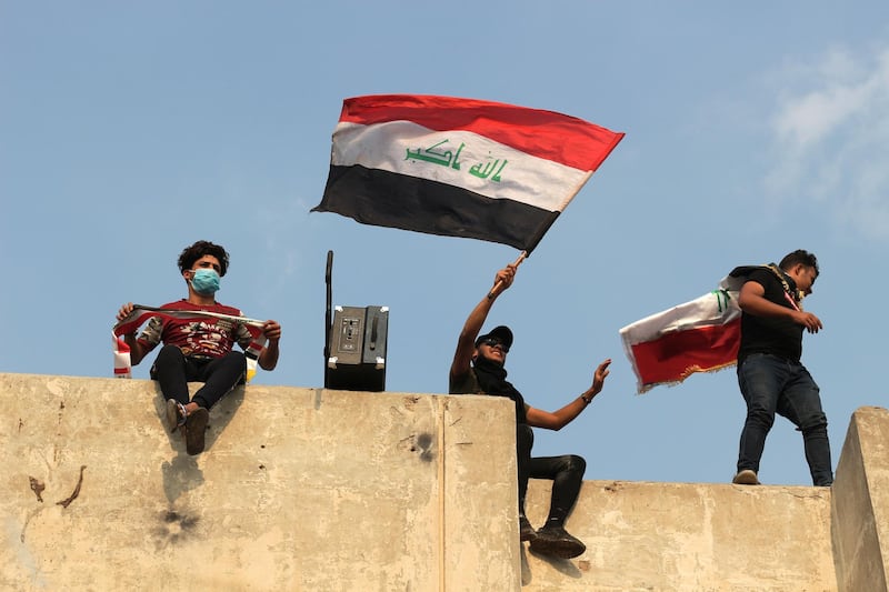 Young people sit atop the Turkish restaurant building. Pesha Magid