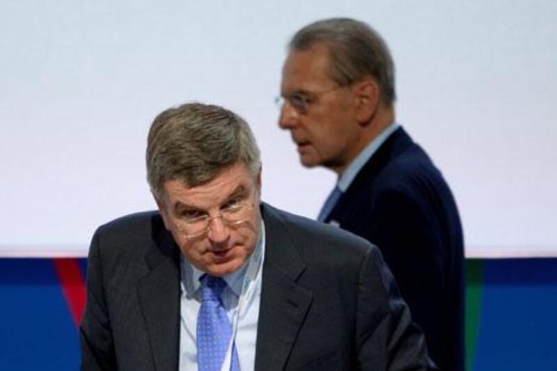 Thomas Bach, in front, is a leading contender to succeed Jacques Rogge as the IOC president. Fabrice Coffrini / AFP