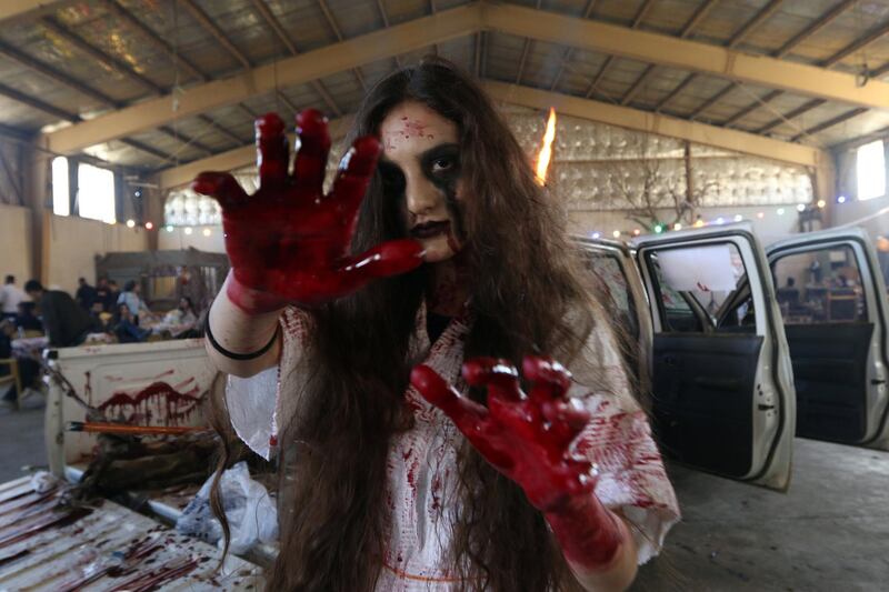 A woman with zombie make-up celebrates Halloween in Sulaimaniya, Iraq. Reuters