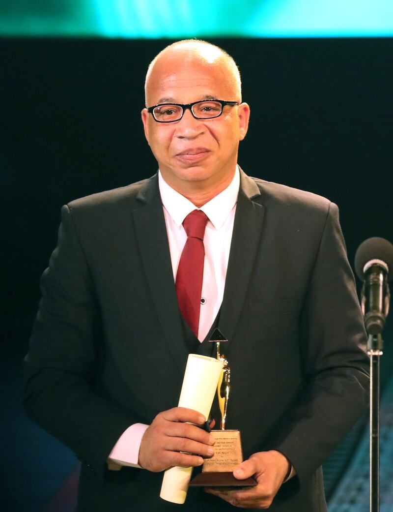 Egyptian actor Sherif Desoky receives an award for Best Actor during the closing ceremony of the 40th Cairo International Film Festival. Photo / EPA