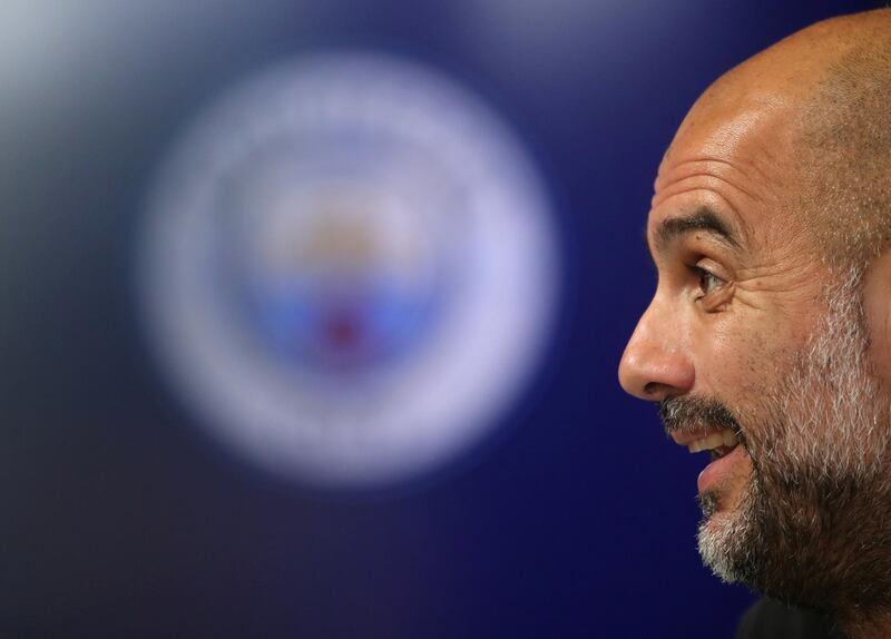 Pep Guardiola speaking at the press conference ahead of Tuesday's Champions League match. Reuters